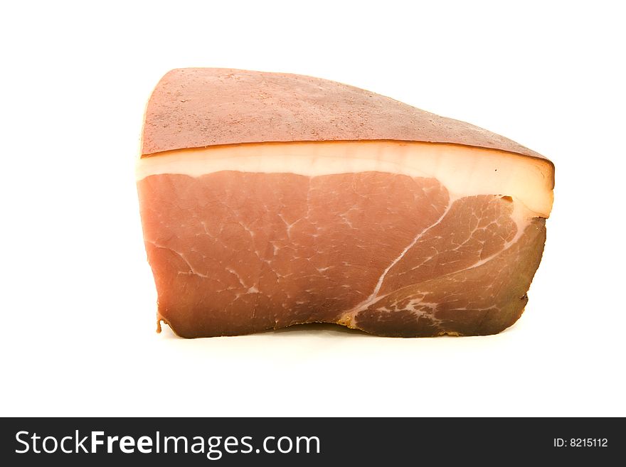 Piece of a ham on a white background. Isolated