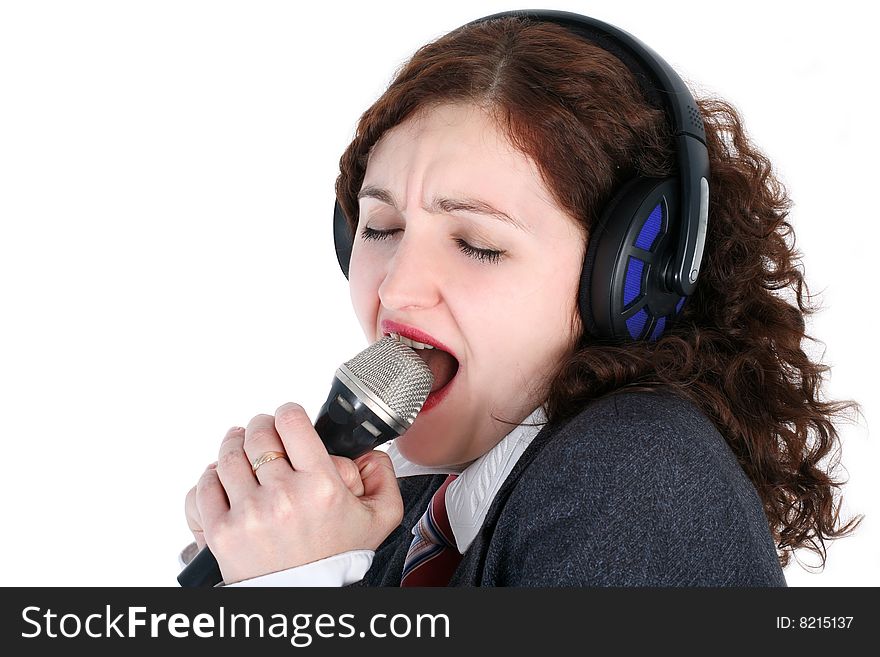 Singing girl in headphones isolated on white