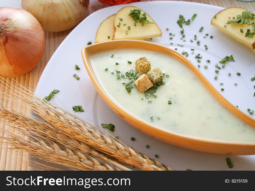 A fresh soup of potatoes with some croutons