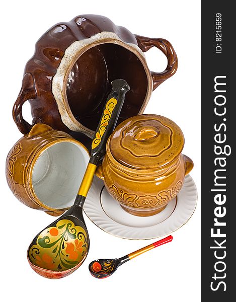 Ceramic ware of two sizes and wooden spoons with drawings. Ceramic ware of two sizes and wooden spoons with drawings.