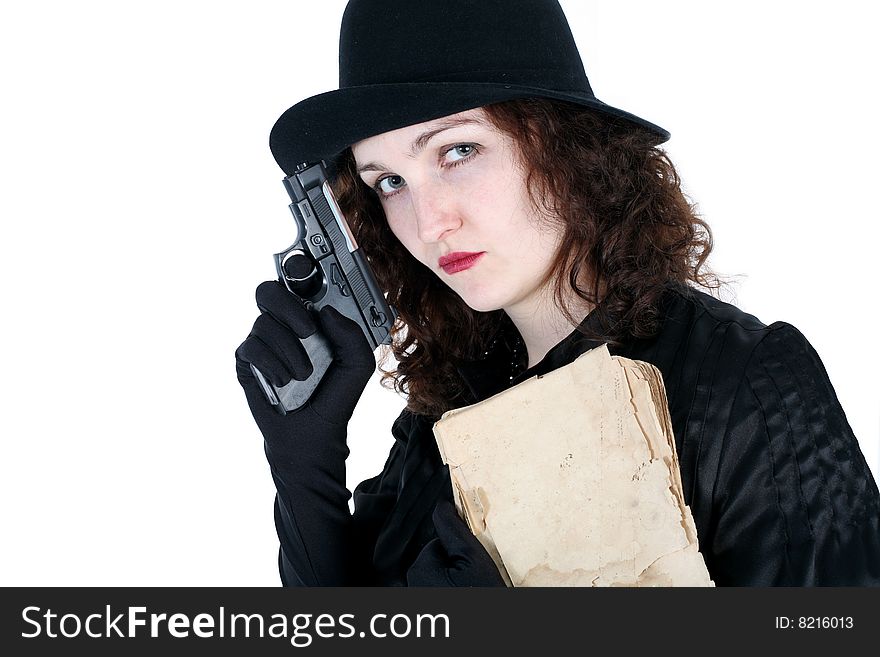 Girl in hat with old book and gun isolated on white