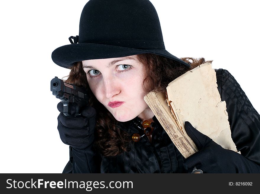 Girl in hat with old book and gun isolated on white. Girl in hat with old book and gun isolated on white