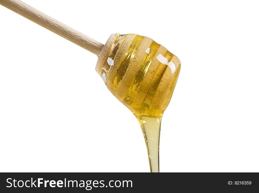 Golden honey isolated on white background