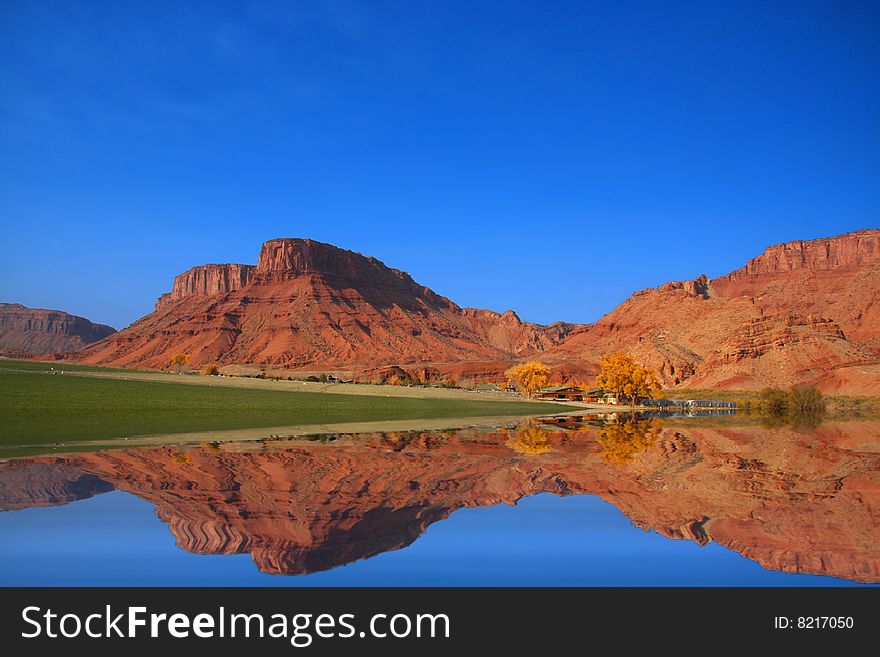 Farm in the red rock country with reflections. Farm in the red rock country with reflections