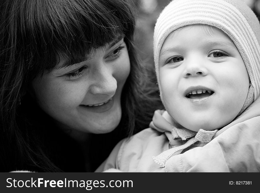 A young mother with her baby. close-up. A young mother with her baby. close-up