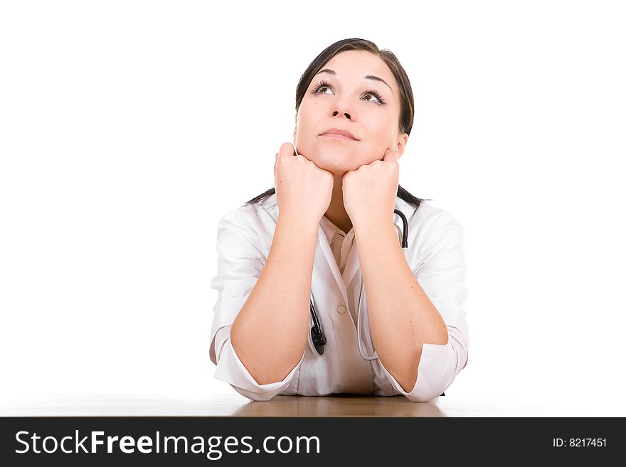 Female Doctor At Desk