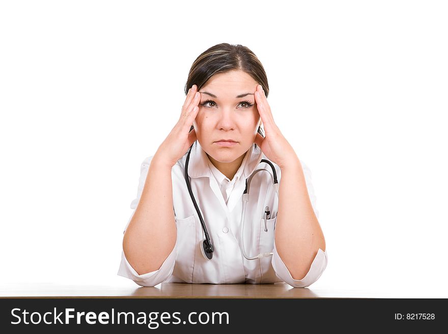 Female Doctor At Desk