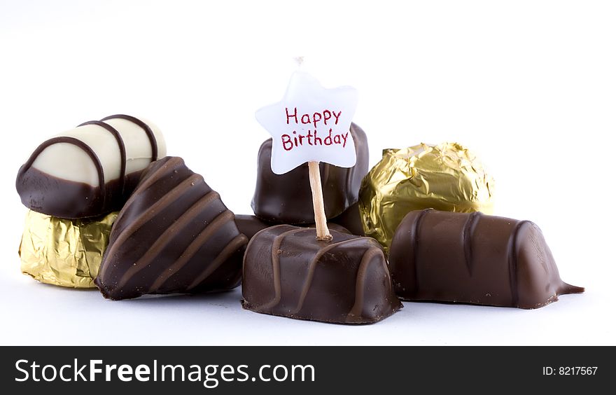 Assorted chocolates isolated on white background