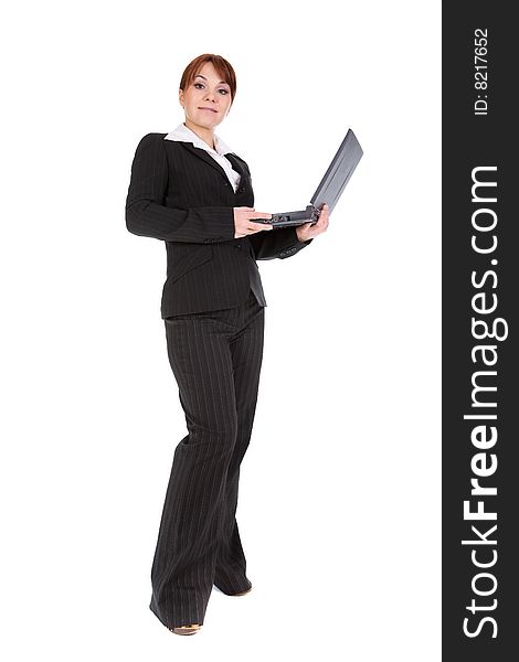 Attractive businesswoman with laptop. over white background