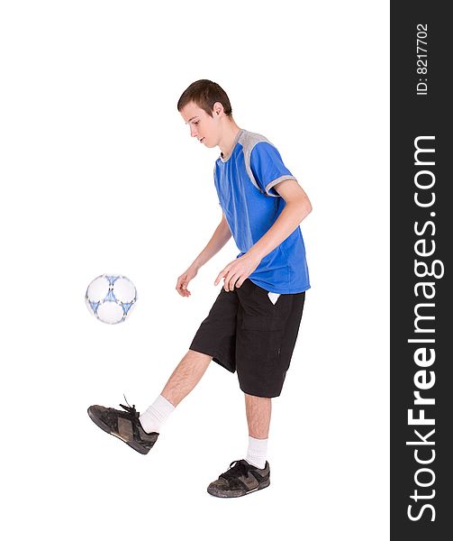 Happy teenager playing football. over white background. Happy teenager playing football. over white background
