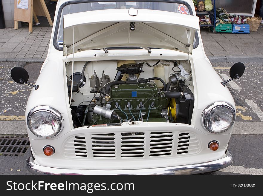 The engine of a classic mini motor car. The engine of a classic mini motor car