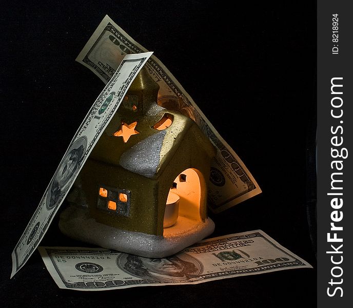 The Small House Covered By Dollars