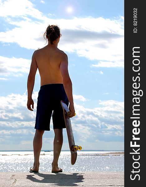 Young man with skate board