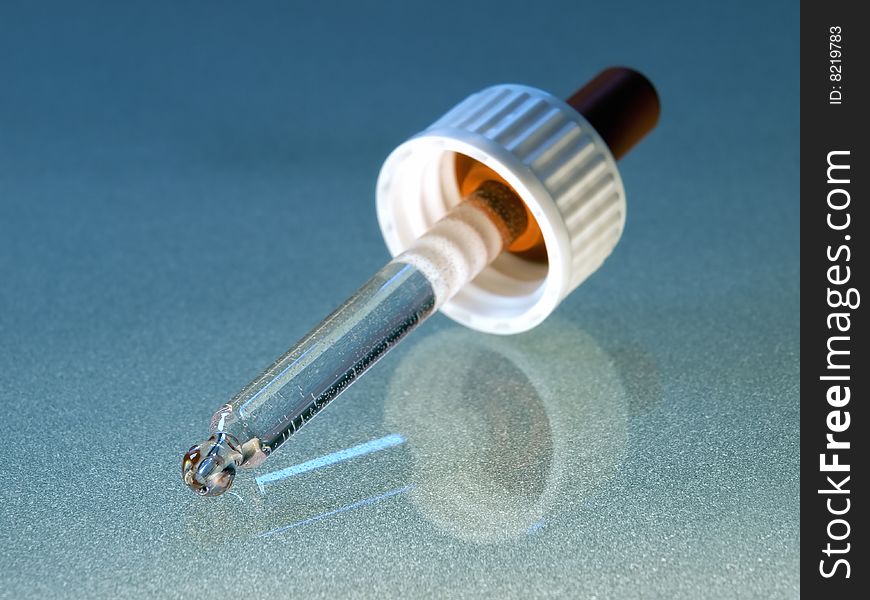 Closeup of eyedropper, usable for research, science  and medical theme.