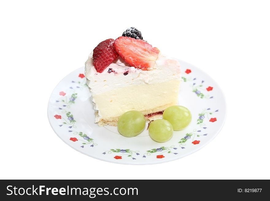 Isolated cake on the colorful plate