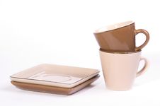 Two Brown And Beige Cups Of Tea With Saucers Royalty Free Stock Images Two Brown And Beige Cups Of Tea With Saucers Royalty Free Stock Images