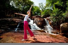 Young Woman Relaxing At The Waterfall Royalty Free Stock Photos Young Woman Relaxing At The Waterfall Royalty Free Stock Photos