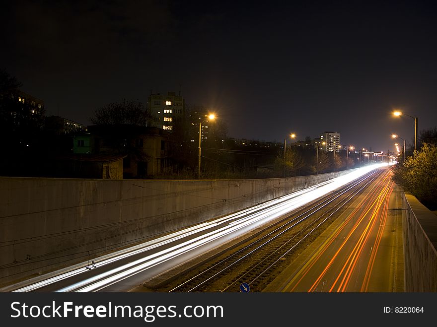 Blurred car motion by night. Blurred car motion by night.