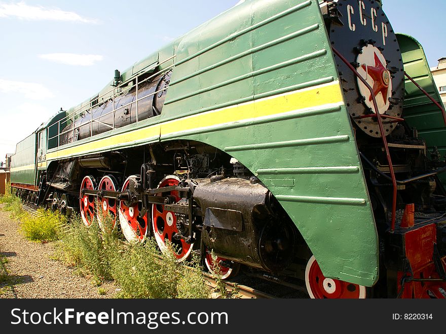 Steam locomotive standing like monument. Northern part of Baikal. Steam locomotive standing like monument. Northern part of Baikal