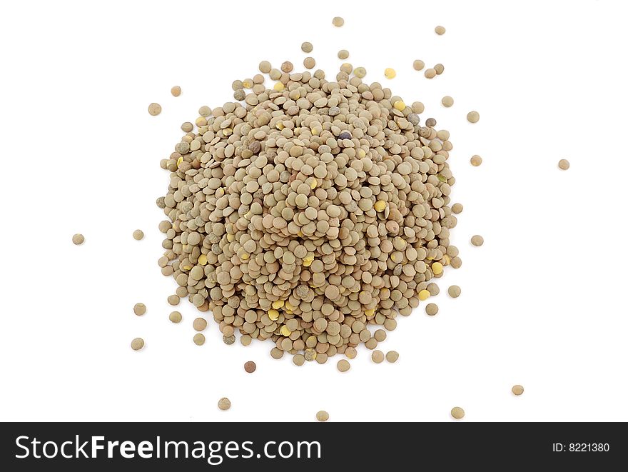 Pile of lentils on white background. Pile of lentils on white background