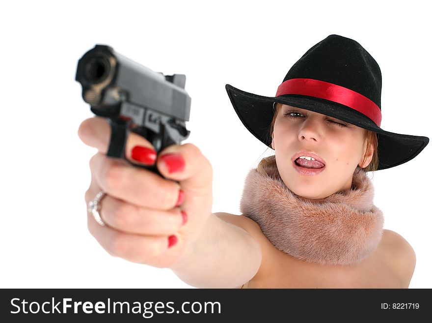 Lovely girl in hat with gun isolated on white
