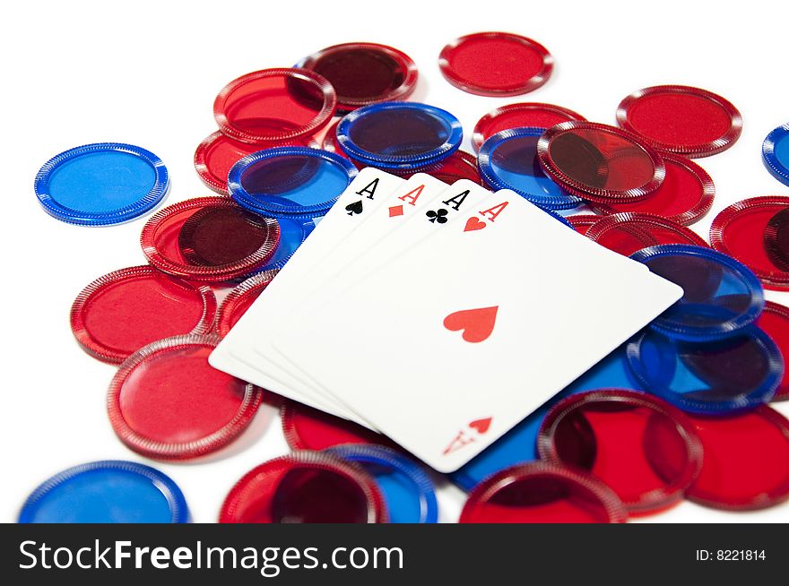 Four aces and chips isolated o white