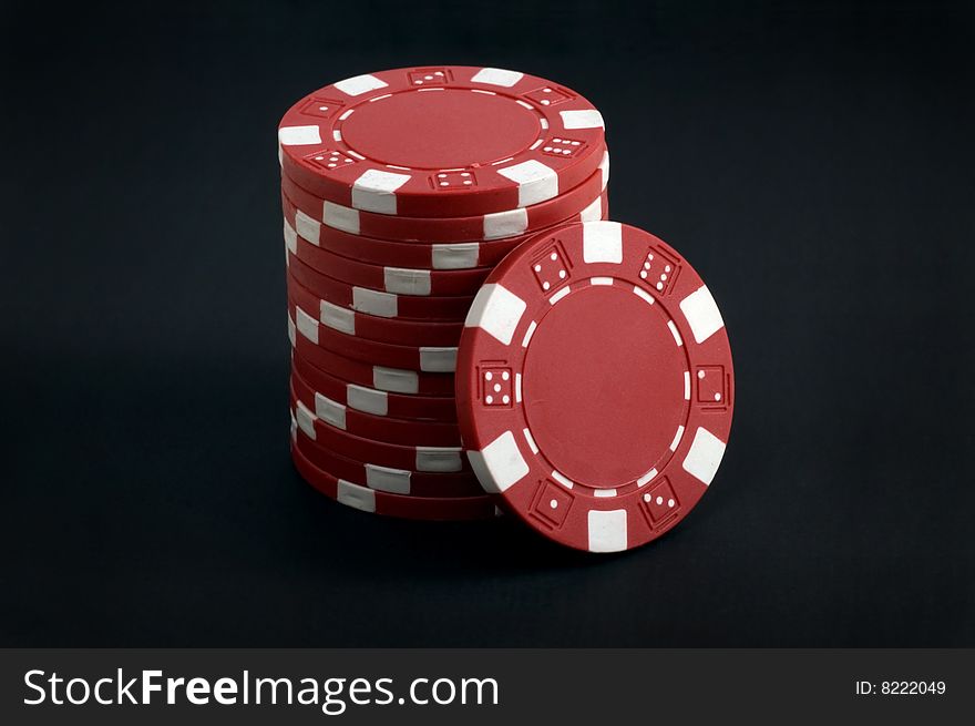 Red Poker Chips on dark  background. Red Poker Chips on dark  background