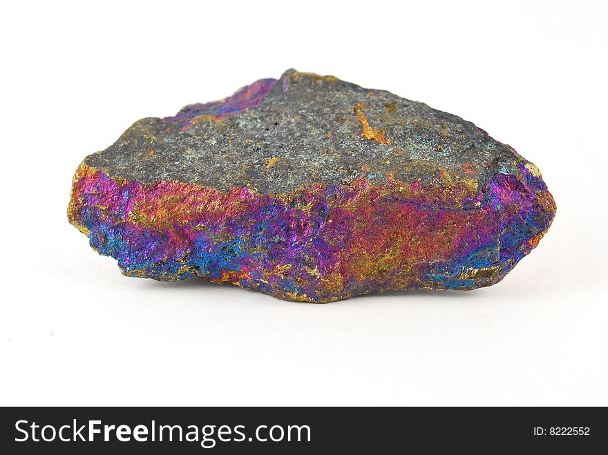 Spectacular mineral sample of Peacock Ore.  This coloration is natural - the photo is directly from the camera with no alterations.  

Makes a great contrast with the dull top surface of the rock