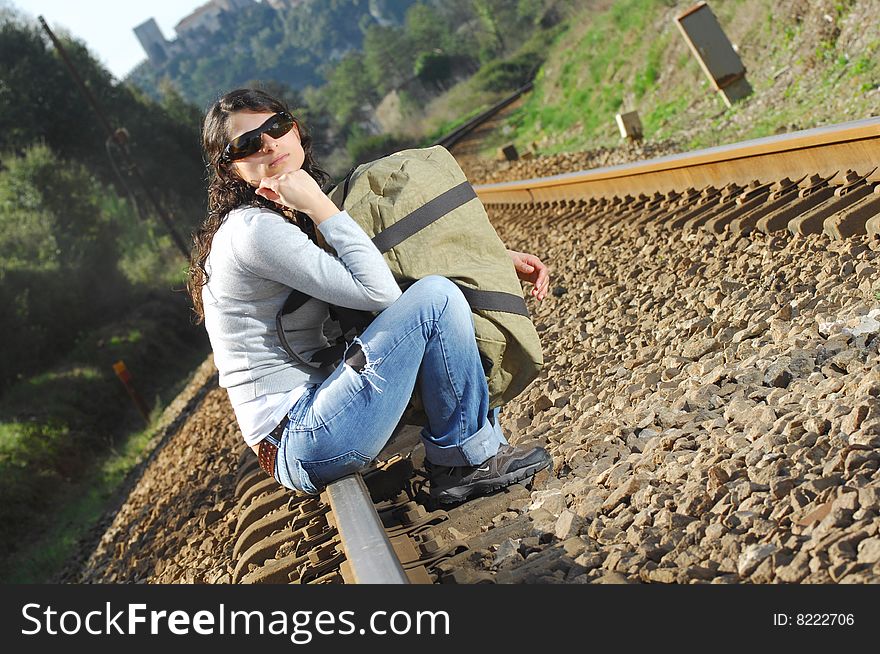 Sitting on a railway alone