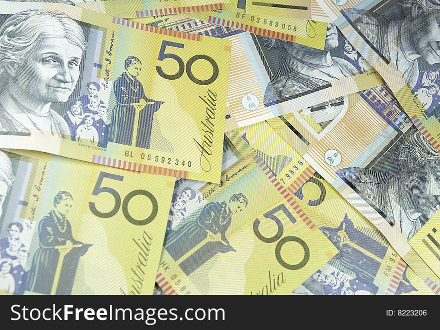 Australian fifty dollar notes spread randomly