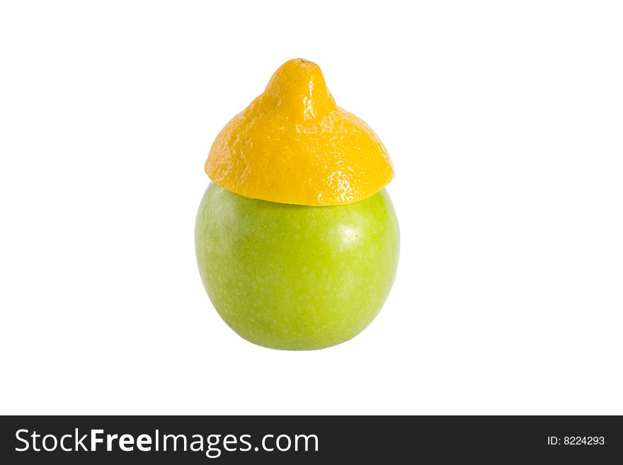 Green fresh apple in a yellow hat from a lemon. Green fresh apple in a yellow hat from a lemon