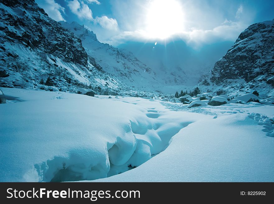 Snow covered mountain with sun. Snow covered mountain with sun