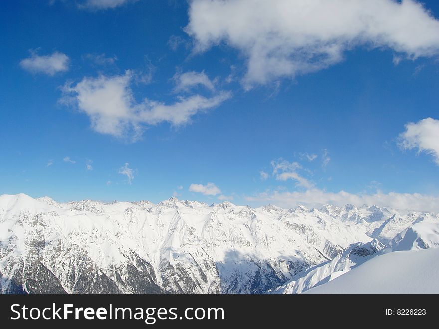 Beautiful view of winter mountain and blue sky. Beautiful view of winter mountain and blue sky