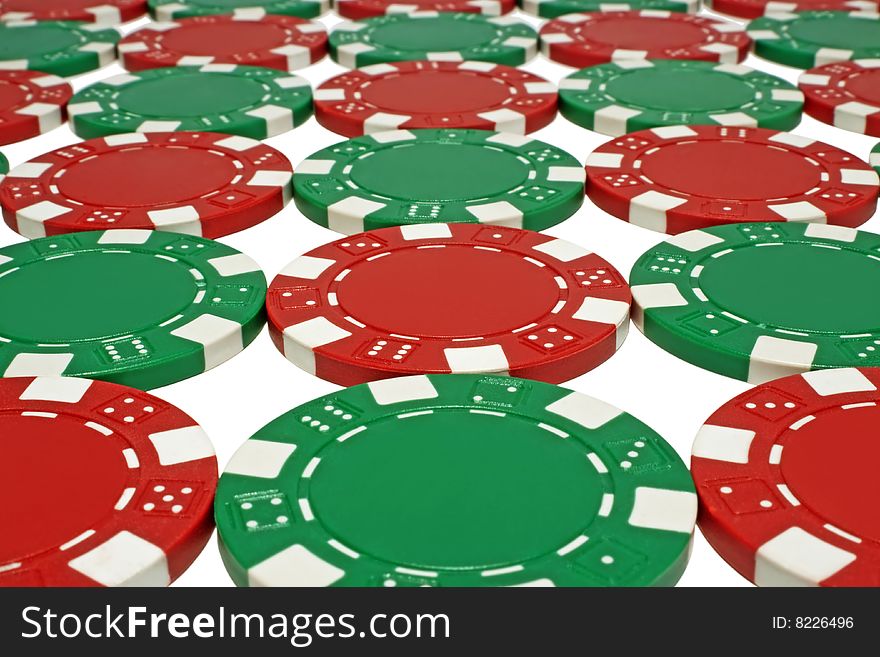 Green and red poker chips isolated on white background