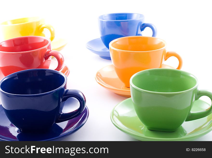 Colourful coffee cups isolated on white