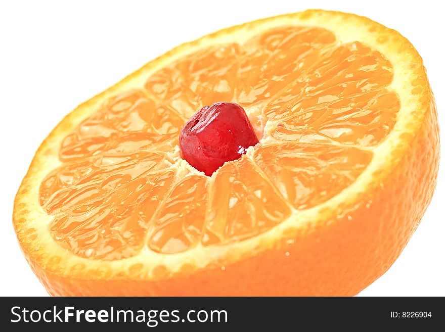 Grain of pomegranate is in a juicy mandarine.