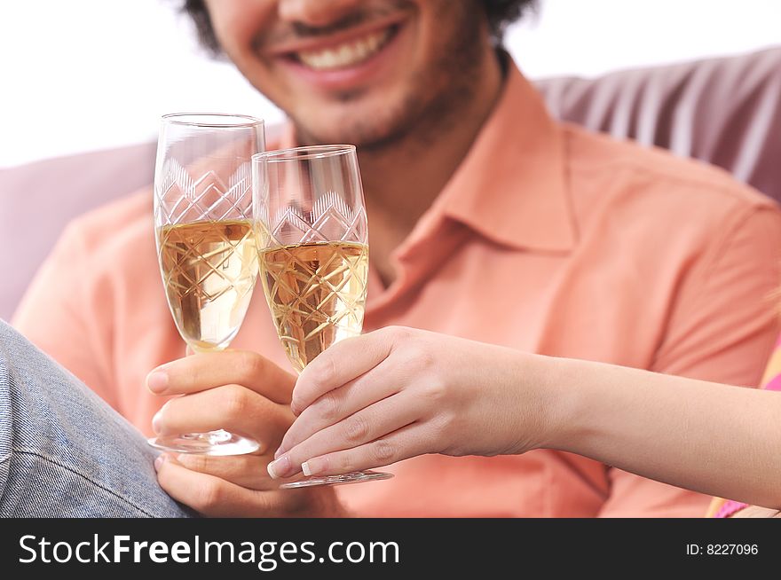 Young couple smiling and drinking together. Young couple smiling and drinking together