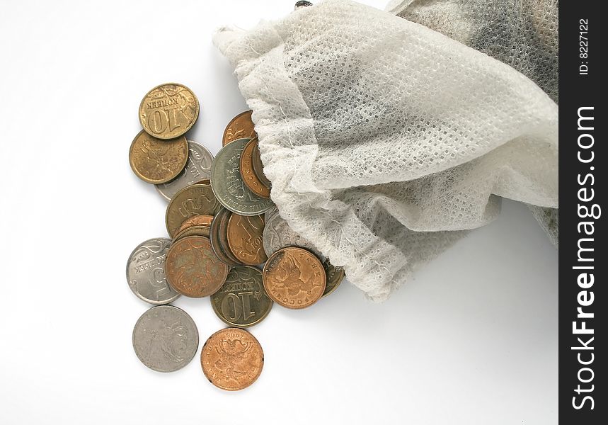 Money spilt from money box on white background. Money spilt from money box on white background