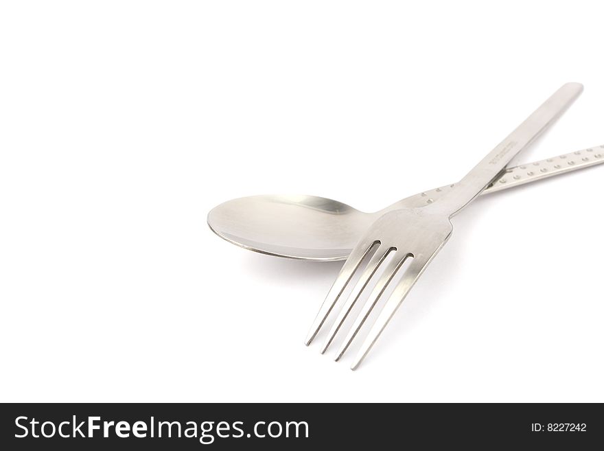 Fork and spoon in white background