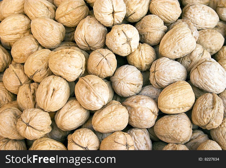 A lot of circassian walnuts with shell