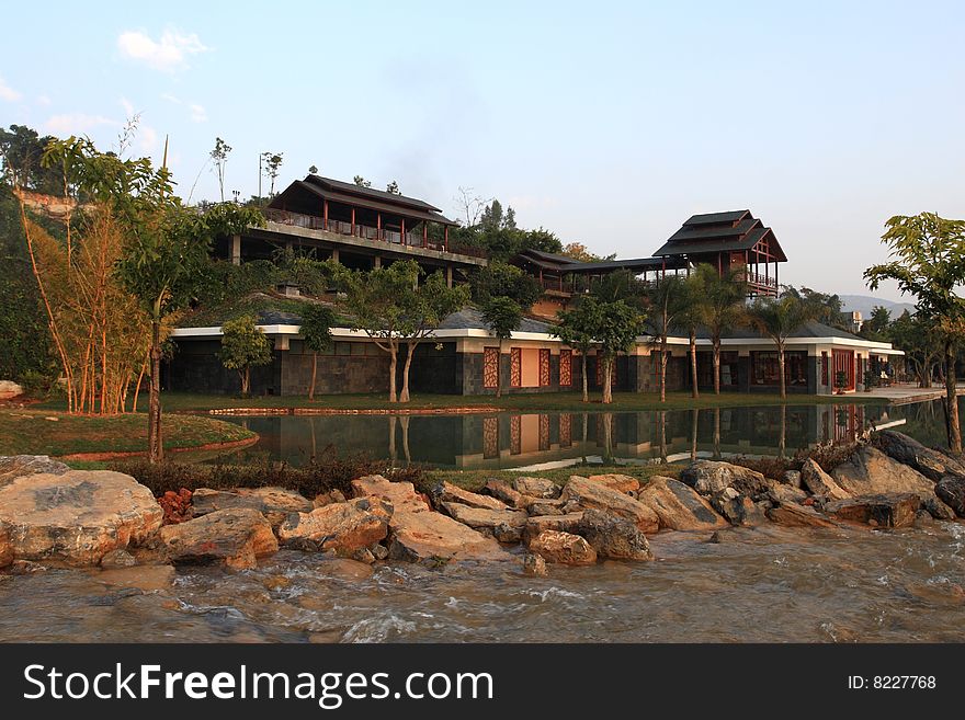 Wooden Houses In The Lake Front