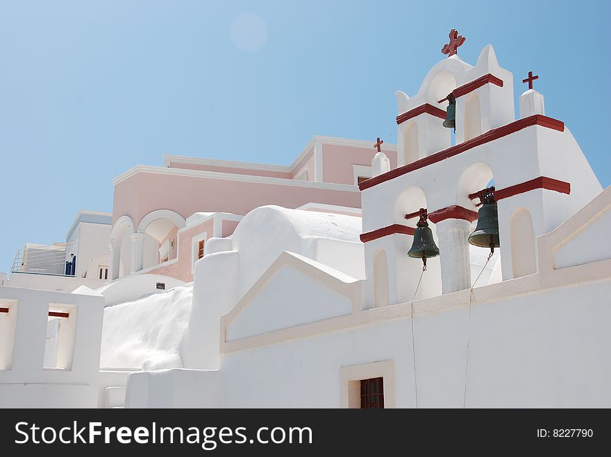 Oia on Santorini Island, Greece - blue sky, church