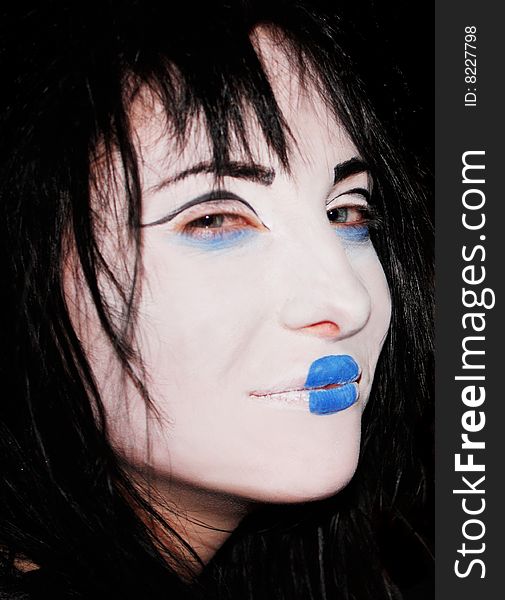 Cruel girl with blue lips, halloween style