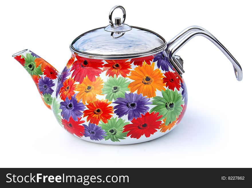 Metal teapot decorated with a bright floral picture on a white background. Metal teapot decorated with a bright floral picture on a white background
