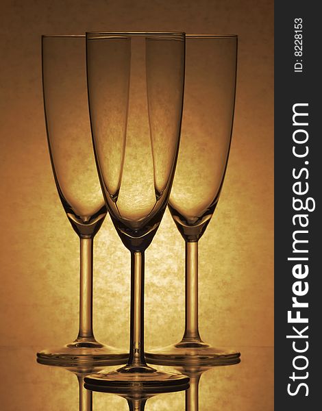 Three glasses of glass on the brown background