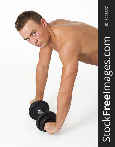 Young man training over white background. Young man training over white background