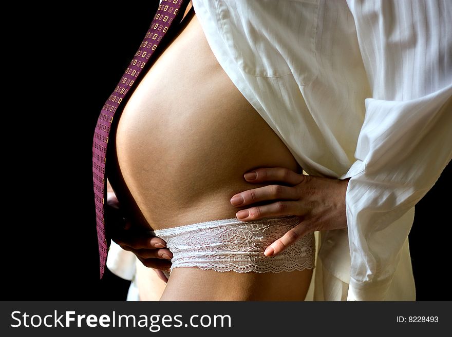 Pregnant woman in shirt and necktie. Pregnant woman in shirt and necktie