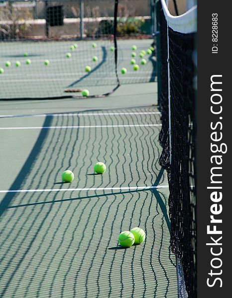 Tennis Net with Tennis Balls on Court. Tennis Net with Tennis Balls on Court
