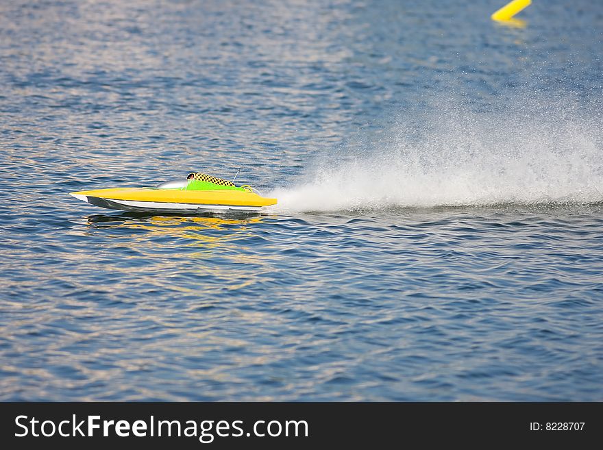 An R/C Model Boat Practicing Laps
