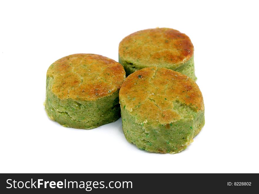 Three mung bean cakes put together on white background.